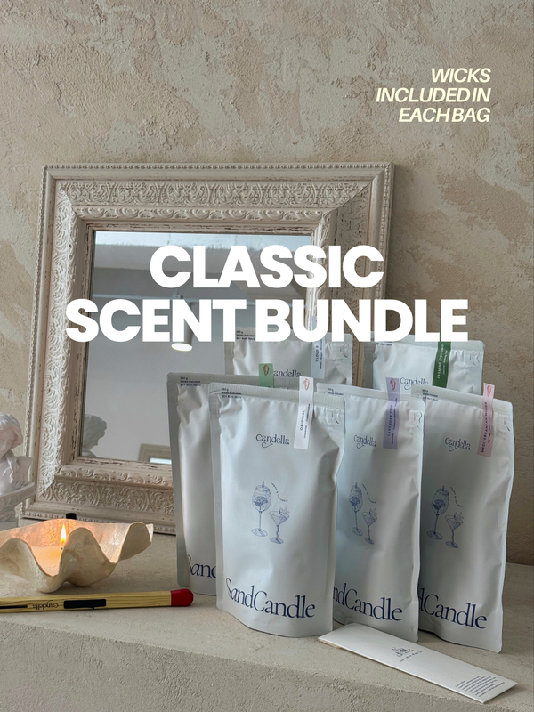 Candle packaging with 'Classic Scent Bundle' text and 'Wicks Included' label, set against a neutral background.
