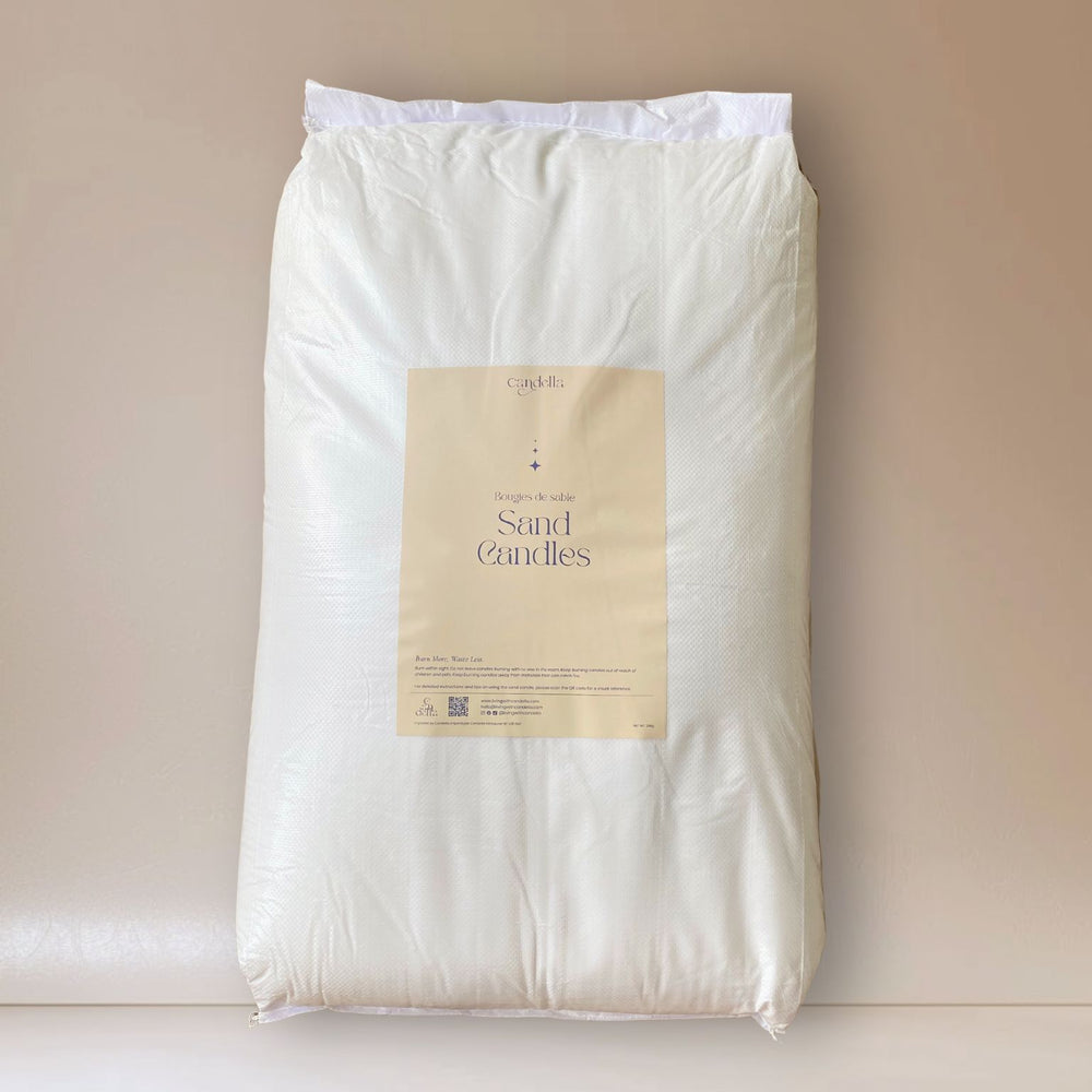 A large white 25kg bag of sand candle wax labeled "Candella Sand Candles" with beige packaging and text in English and French, designed for event vendors for a sustainable candle experience.