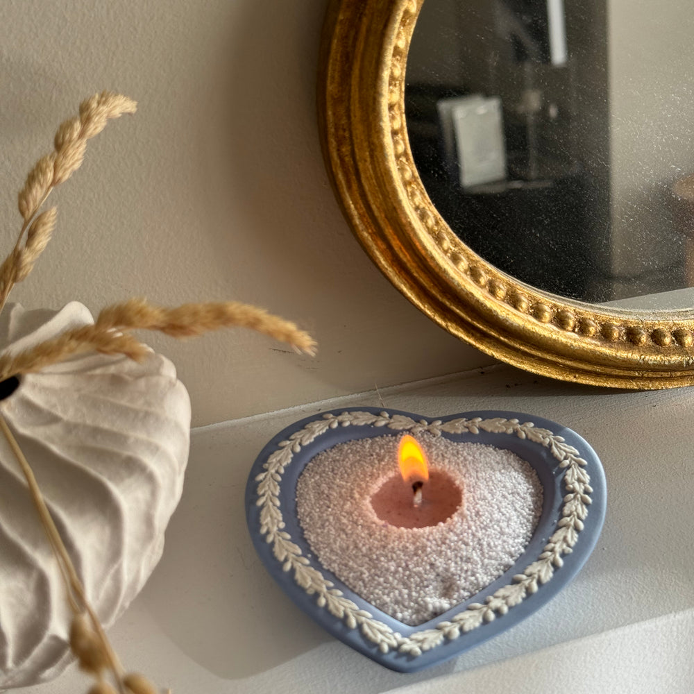 candella lavender fog sand candle lighting in a vintage wedgewood heart shaped plate