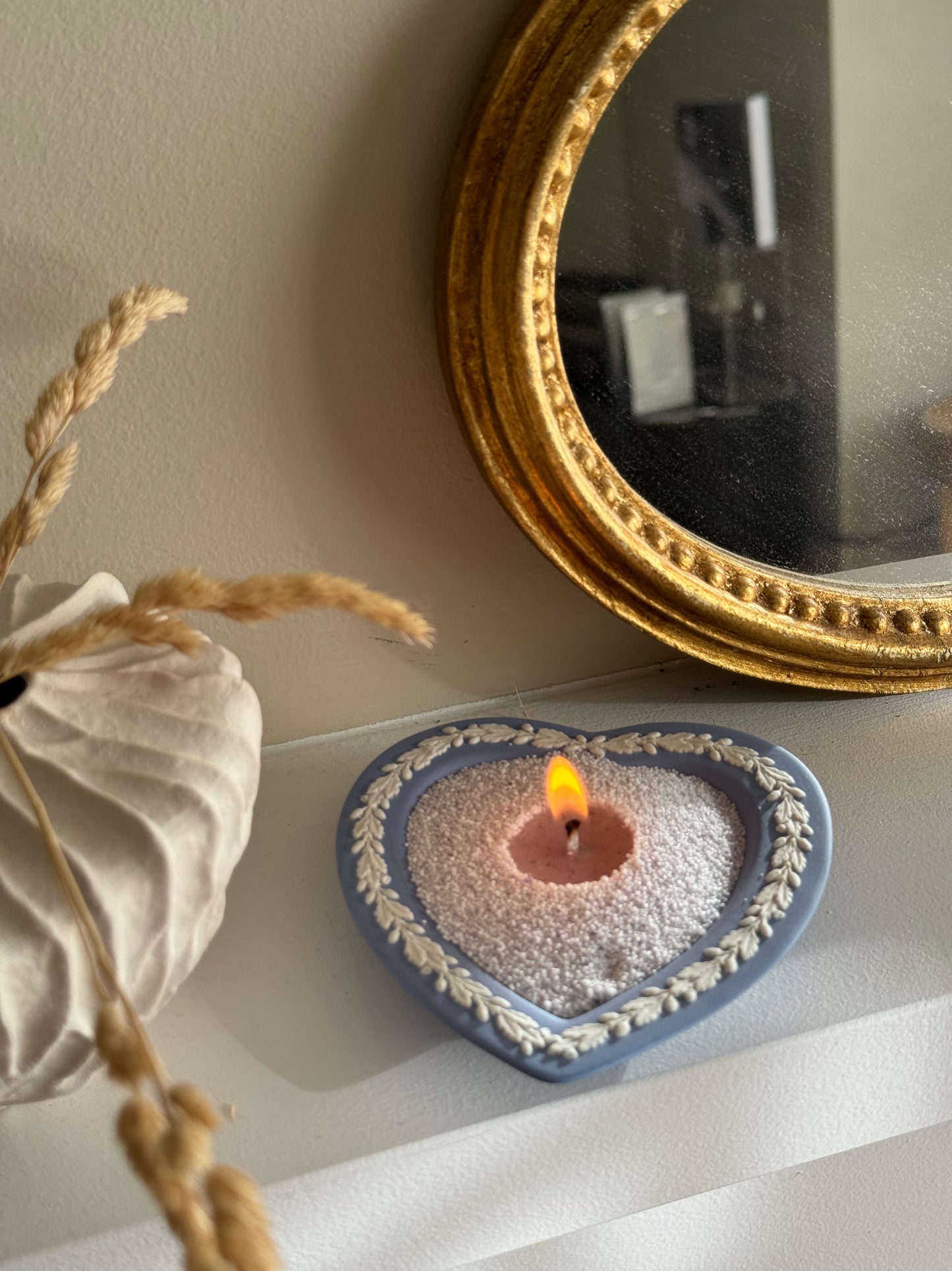 candella lavender fog sand candle lighting in a vintage wedgewood heart shaped plate